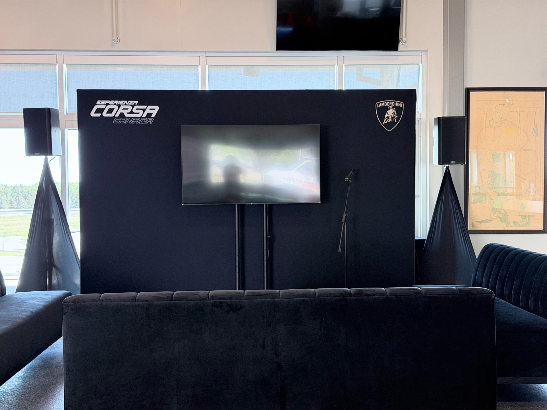 Representative scenic wall with integrated display screens