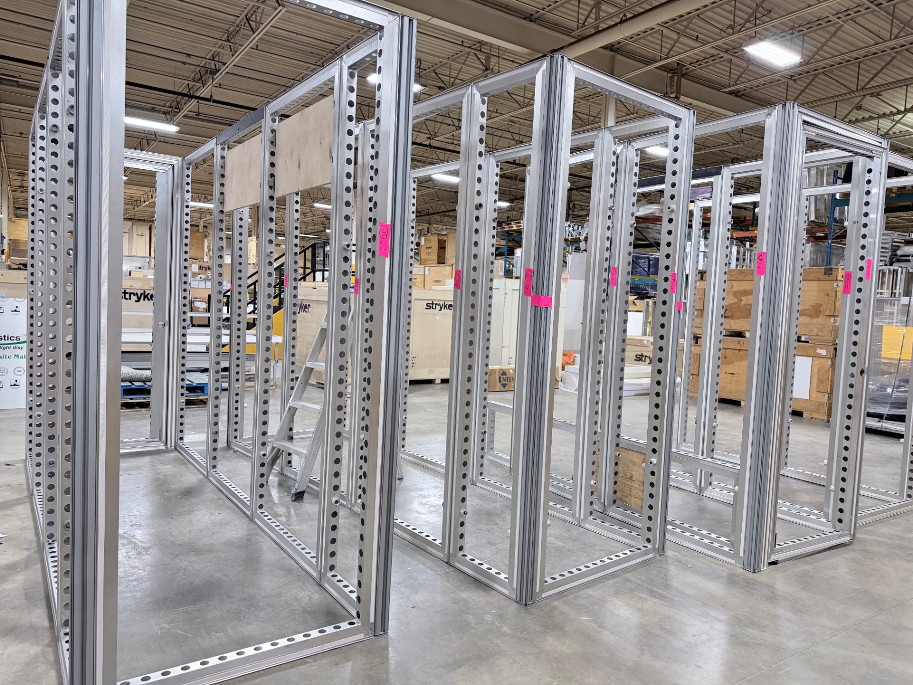 Modular scenic framing components prepared for an event installation